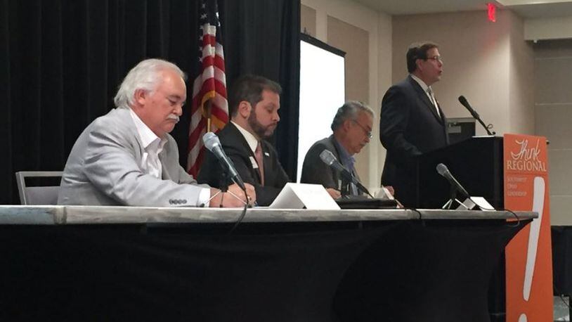 Panelists at the Think Regional Summit, held April 28, 2017, at Central Park of West Chester, included (left to right) Alfonso Cornejo, president of the Cincinnati Hispanic Chamber of Commerce; Brendon Cull, chief operating officer of the Cincinnati USA Chamber of Commerce; Phillip Parker, president and CEO of the Dayton Chamber of Commerce; and Joe Hinson, president and CEO of the West Chester-Liberty Chamber Alliance. ERIC SCHWARTZBERG/STAFF