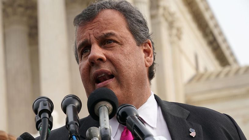 FILE PHOTO: Former New Jersey Governor Chris Christie speaks to members of the media in front of the U.S. Supreme Court December 4, 2017 in Washington, DC.