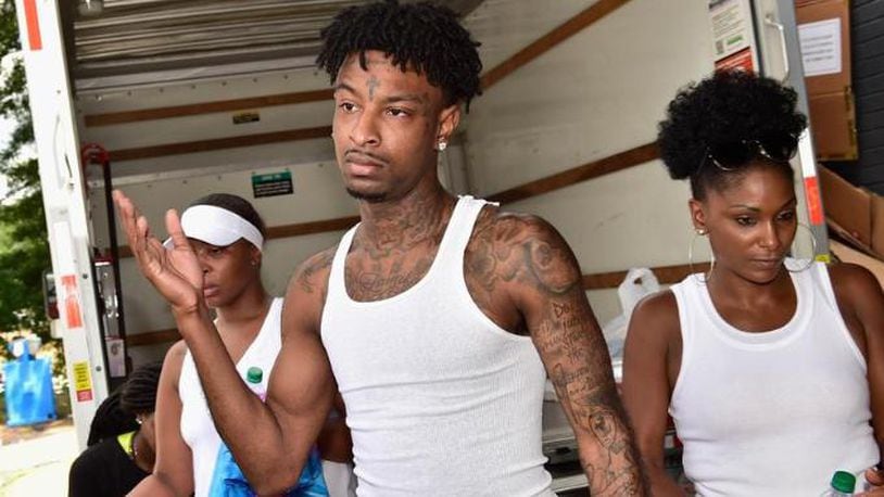 21 Savage and his mom, Heather, at his "Issa Back 2 School Drive" in Atlanta on Aug. 5.