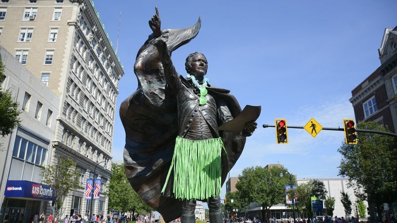 The statue of Alexander Hamilton on High Street was decorated in a green grass skirt, a lei and green shades for the Alive After 5 party on July 5.
