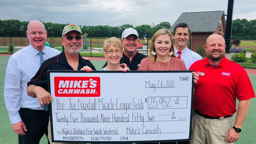 Mike's Car Wash donated nearly $26,000 to the Joe Nuxhall Miracle League Fields. Pictured from left, back row, are Mike's Car Wash CEO Mike Dahm, JNMLF board member Ron Riedy, and Mike's Car Wash COO Ty Dubay, and from left front, Miracle League volunteer CEO Kim Nuxhall, JNMLF Secretary Bonnie Nuxhall, Mike's Car Wash Assistant Marketing Manager Shannon Sellers and Mike's Car Wash Area Director Charles Abell. PROVIDED