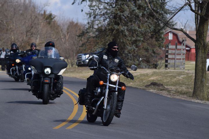 PHOTOS: Thousands of Outlaws attend motorcycle gang leaders funeral at Montgomery County Fairgrounds.