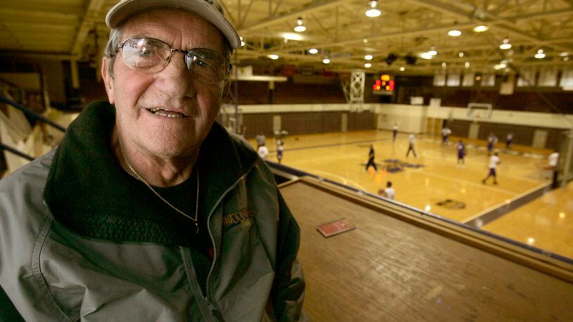 Jack Gordon, of WPFB radio in Middletown, the longtime radio voice of Middletown High School football and basketball, at Wade E. Miller Gym in Middletown, Ohio Tuesday Dec. 1, 2009. Gordon died Saturday at the age of 85. FILE PHOTO