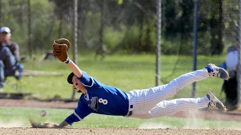 Hamilton first baseman Alex Mills dives for the ball during a game against Fairfield at Joe Nuxhall Field in Fairfield on May 7, 2017. CONTRIBUTED PHOTO BY E.L. HUBBARD