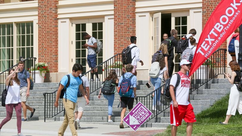 Students walk between class periods on the campus of Miami University in Oxford, Wednesday, Aug. 30, 2017. GREG LYNCH / STAFF