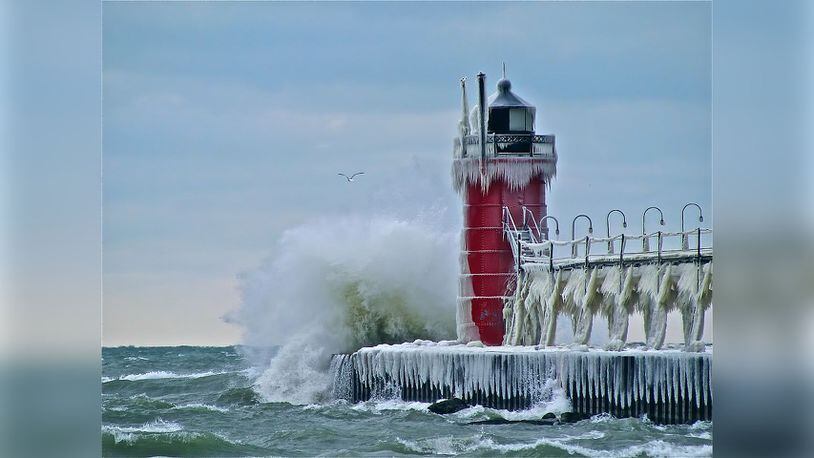 A winter view of the South Pier Lighthouse in South Haven, Michigan, along the shores of Lake Michigan