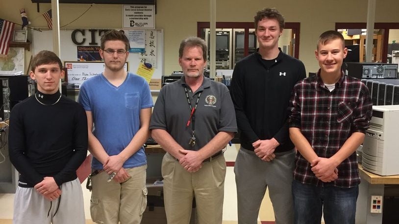Students from Ross High School in Butler County have designed a school security cell phone app. Their team has been named one of 10 national finalists in Samsung Solve for Tomorrow contest, which will be held soon in New York City. Pictured (from left) are: Kody Bryant, Tyler West, instructor Thomas O’Neill, Grant Ridge and Jacob Halm. CONTRIBUTED