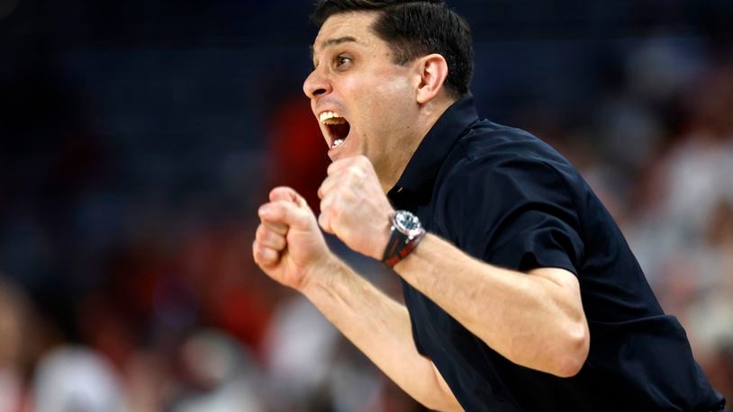 Cincinnati head coach Wes Miller calls a play during the first half of an NCAA college basketball game against Houston in the semifinals of the American Athletic Conference Tournament, Saturday, March 11, 2023, in Fort Worth, Texas. (AP Photo/Ron Jenkins)
