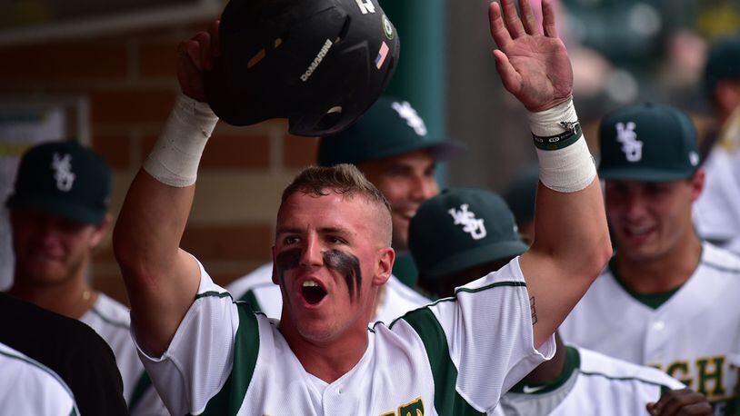 Wright State’s Peyton Burdick celebrates after scoring one of five Raiders runs in the first inning of the Horizon League championship game against UIC on Saturday at Nischwitz Stadium. JOSEPH CRAVEN/CONTRIBUTED PHOTO