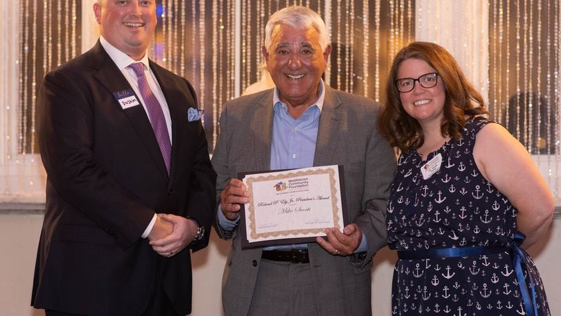 Mike Scorti, center, won the Roland P. Ely Jr. President's Award Thursday night during the 37th annual Middletown Community Foundation meeting. He's picture with Dustin Hurley, president of the board, and Sarah Nathan, executive director. SUBMITTED PHOTO