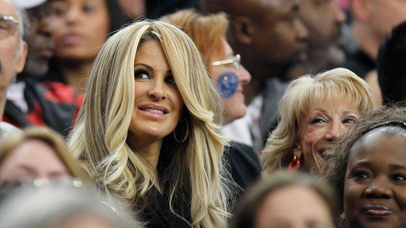 ATLANTA, GA - JANUARY 02:  Kim Zolciak, of the reality television show The Real Housewives of Atlanta, watches the game between the Atlanta Falcons and the Carolina Panthers at Georgia Dome on January 2, 2011 in Atlanta, Georgia.  (Photo by Kevin C. Cox/Getty Images)