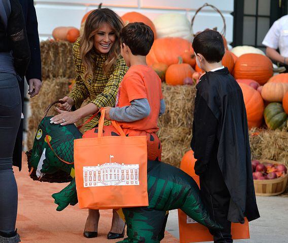 Photos: President Trump, first lady Melania Trump welcome children to White House for Halloween