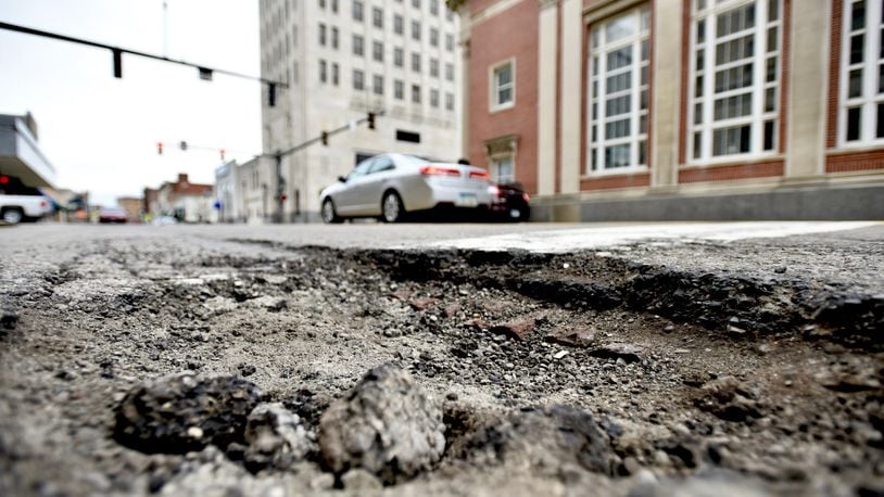 The new gas tax hike will bring an extra $7 million to Butler County communities that struggle to keep up with poor pavement. NICK GRAHAM / STAFF
