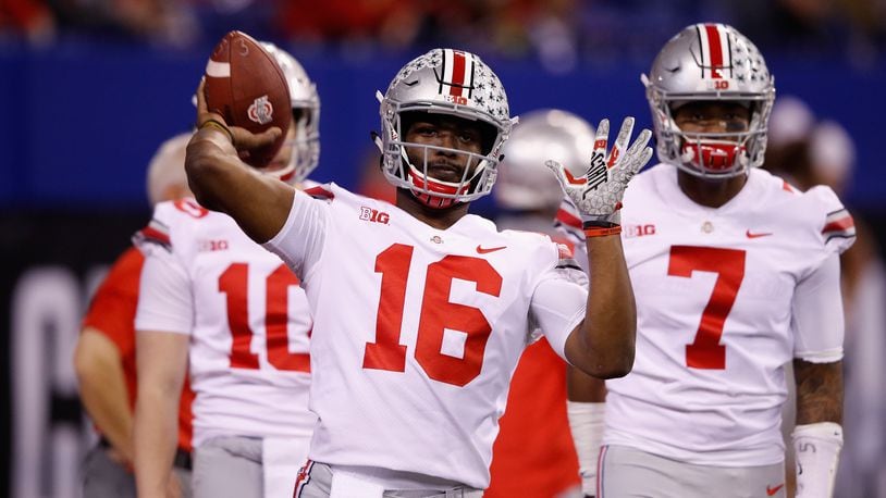 INDIANAPOLIS, IN - DECEMBER 02:  Quarterback J.T. Barrett #16 of the Ohio State Buckeyes looks to pass while warming up before taking on the Wisconsin Badgers in the Big Ten Championship game at Lucas Oil Stadium on December 2, 2017 in Indianapolis, Indiana.  (Photo by Joe Robbins/Getty Images)