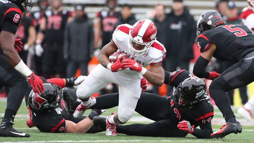 MUNCIE, INDIANA - NOVEMBER 29: Tyre Shelton #20 of the Miami of Ohio Redhawks runs the ball in the game against the Ball State Cardinals during the second quarter at Scheumann Stadium on November 29, 2019 in Muncie, Indiana. (Photo by Justin Casterline/Getty Images)