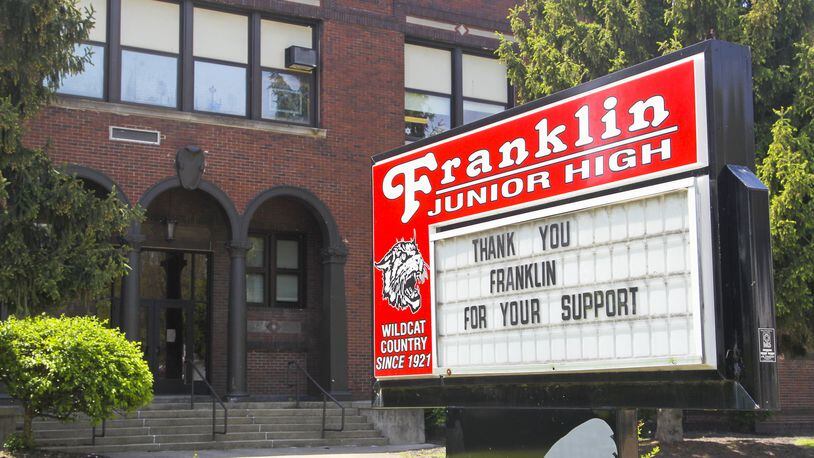 The Franklin Board of Education voted May 20, 2019 to move forward with its building project that will eventually replace the century-old Franklin Junior High School building. The board voted to enter the state’s Expedited Local Partnership Program in which the board will do its projects in segments and pay its share of the project, about 44 percent, of the estimated $120 million project. Franklin voters could see a bond issue on the ballot as early as November 2020. FILE PHOTO A sign outside Franklin Junior High School, Wednesday, May 7, thanks voters for passing their school levy. GREG LYNCH / STAFF