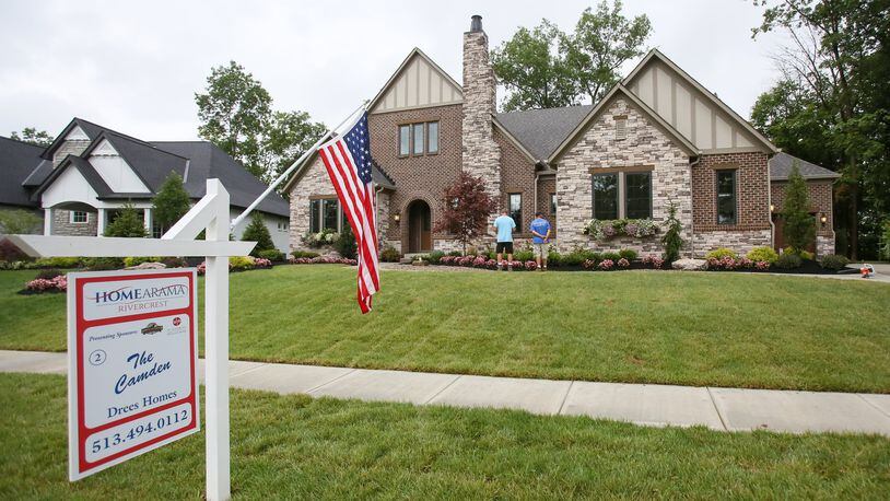 Contractors put the finishing touches on homes that are part of Homearama 2017, which is set for its 54th show, running until July 23 at Rivercrest at 1295 U.S. 22 in Warren County’s Hamilton Twp. GREG LYNCH / STAFF