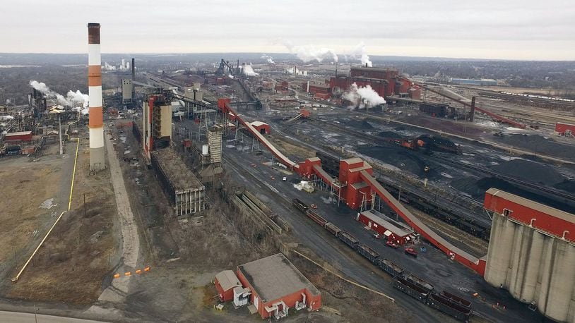Aerial view of the AK Steel Middletown Works. The big steel producer covers more than 2,700 acres in the city to operate coke ovens, a blast furnace, hot strip mill and more than a dozen other steel production related processes. TY GREENLEES / STAFF