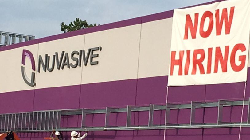 NuVasive Inc., which announced a move from Fairborn to West Carrollton in late 2015 as part of a $45 million expansion, has been looking for qualified workers. NICK BLIZZARD/PHOTO