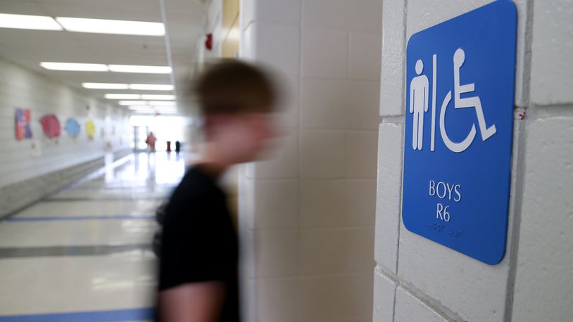 Public schools must permit transgender students to use bathrooms and locker rooms consistent with their chosen gender identity, according to an Obama administration directive issued amid a court fight between the federal government and North Carolina. BILL LACKEY / STAFF
