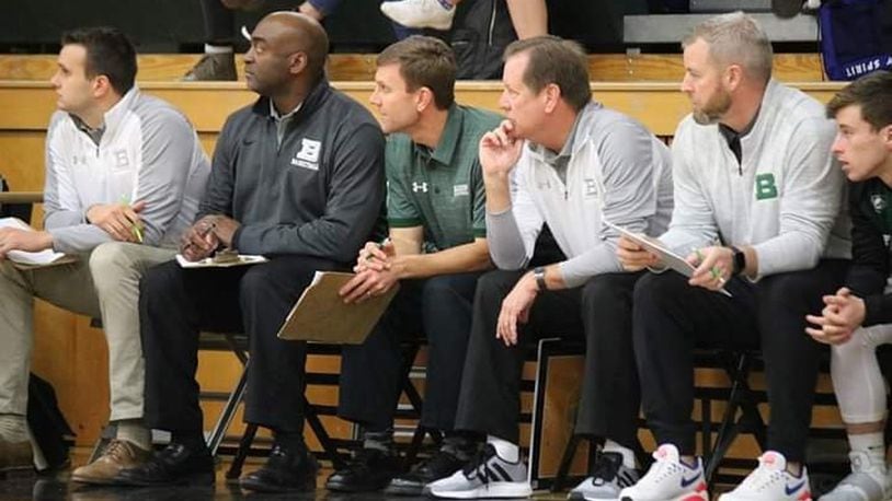 Badin coach Gerry Weisgerber (with hand on chin) watches Tuesday night’s game against visiting Northwest with his coaching staff at Mulcahey Gym in Hamilton. Badin won 70-52. CONTRIBUTED PHOTO BY TERRI ADAMS