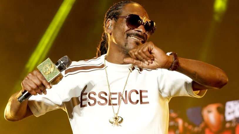 NEW ORLEANS, LA - JULY 06:  Snoop Dogg performs onstage during the 2018 Essence Festival presented By Coca-Cola - Day 1 at Louisiana Superdome on July 6, 2018 in New Orleans, Louisiana. Snoop Dogg had been scheduled to perform at the 2021 Cincinnati Music Festival, but the festival has been postponed to 2022. (Photo by Bennett Raglin/Getty Images for Essence)