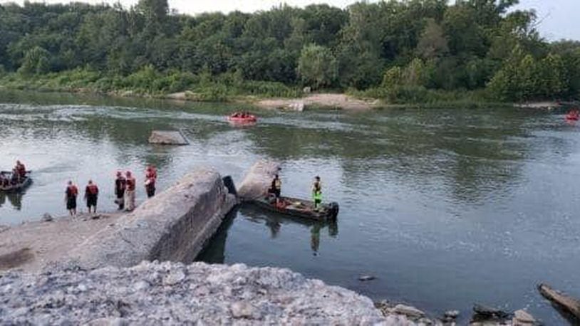 The Butler County Sheriff's Office marine unit along with units from Middetown, Monroe and Franklin work to find a man who did not resurface while swimming Tuesday night in the Great Miami River. BUTLER COUNTY SHERIFF'S OFFICE