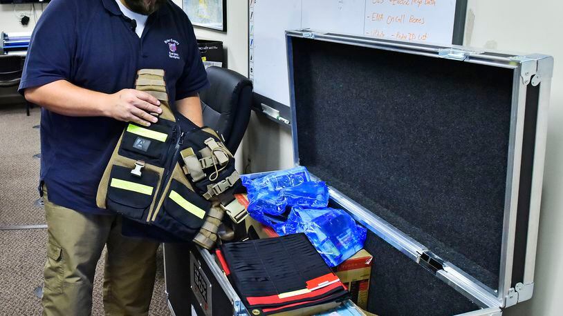 Jim Bolen with the Butler County Emergency Management Agency organized supplies last year before a crew of about 15 people traveled to Florida to assist in Hurricane Irma recovery. The Butler County EMA may be deployed to Virginia soon to help ahead of Hurricane Florence. NICK GRAHAM/STAFF