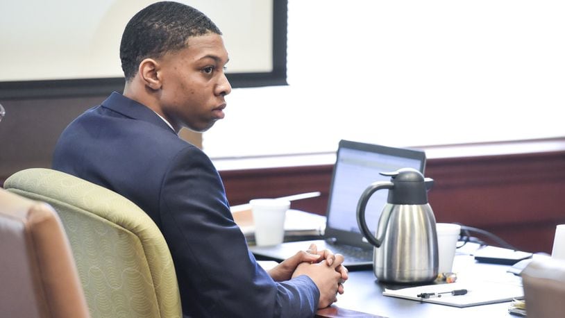 Kameron Tunstall, charged in the shooting death of 13-year-old Jararius Gilbert in August 2018, sits during the third day of his trial Wednesday, April 24, 2019 in Butler County Common Pleas Court in Hamilton. NICK GRAHAM/STAFF