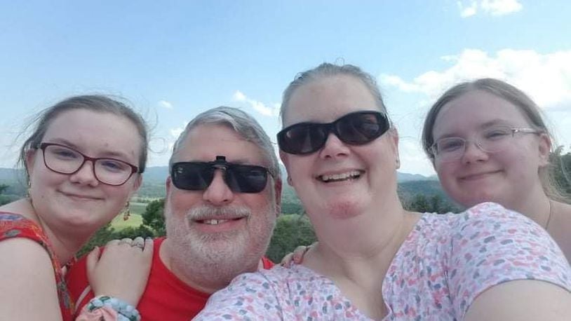 The Norvell family was happy and healthy last year. This year, the entire family, from left, Allison, Keith, Susan and Sarah, have been diagnosed with the coronavirus. Keith is in the Intensive Care Unit at University of Cincinnati Hospital. SUBMITTED PHOTO