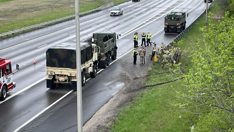A U.S. Army Humvee crash seriously injured a passenger, a 41-year-old Dayton man, who was ejected after the military vehicle struck two semitrailers in the southbound lanes past the Union Center Boulevard exit. MARC PRICE/WCPO 9
