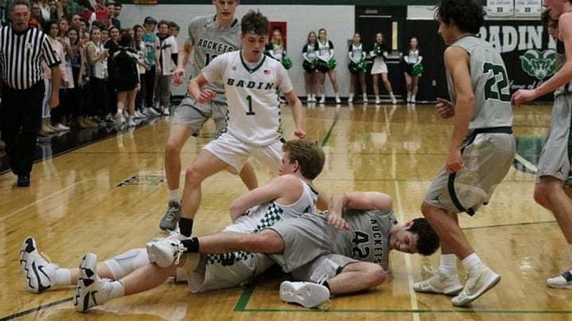Badin’s Justin Pappas gets on the ground and fights for the ball with Josh Burkhardt (42) of McNicholas during Friday night’s game at Mulcahey Gym in Hamilton. McNick won 47-45. CONTRIBUTED PHOTO BY TERRI ADAMS