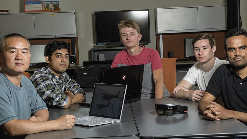 From left: Yong Pei, associate professor of computer science and engineering, and student researchers Miteshkumar Vasoya, Chris Rave, Logan Frank and Ashutosh Shivakumar. (Photo provided by Erin Pence, Wright State University).
