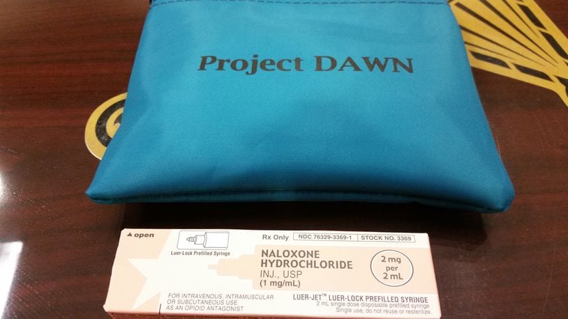 A Project DAWN kit contains two doses of Naloxone, or Narcan, a drug that blocks the effects of opioids. The kits are being dispensed by the Butler County Deptartment of Health in an effort to combat drug overdoses. WAYNE BAKER/STAFF