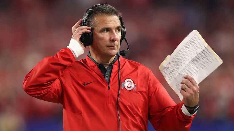 GLENDALE, AZ - DECEMBER 31:  Head coach Urban Meyer of the Ohio State Buckeyes looks on against the Clemson Tigers during the 2016 PlayStation Fiesta Bowl at University of Phoenix Stadium on December 31, 2016 in Glendale, Arizona.  (Photo by Matthew Stockman/Getty Images)