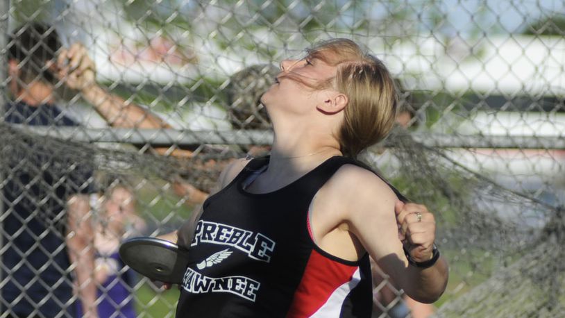 Preble Shawnee sophomore Megan Roell competes in the discus during the first day of the SWBL track and field meet at Northridge last season. MARC PENDLETON / STAFF