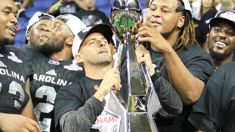 Carolina head coach Billy Back celebrates winning the National Arena League championship last season with a 66-8 victory over the Columbus Lions at the Greensboro Coliseum in Greensboro, N.C. PHOTO COURTESY OF CAROLINA COBRAS