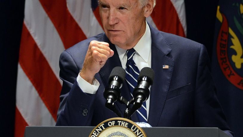 Vice President Joe Biden clinches his fist, during his speech regarding cancer research on Friday, Oct. 21, 2016, at The Commonwealth Medical College in downtown Scranton, Pa. Biden campaigned Monday in Ohio, where he had stops in Cleveland, Toledo and Dayton. (Butch Comegys/The Times & Tribune via AP)