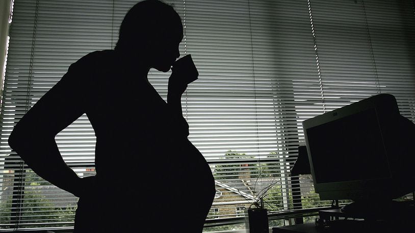 In this photo illustration a pregnant woman is seen standing on July 18, 2005 in London, England.