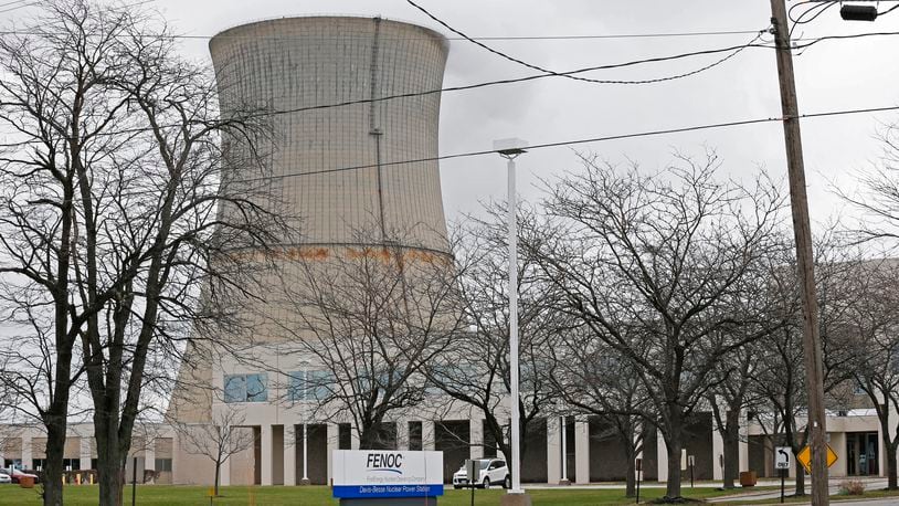 FILE – This April 4, 2017, file photo shows the entrance to FirstEnergy Corp.'s Davis-Besse Nuclear Power Station in Oak Harbor, Ohio. Akron-based FirstEnergyCorp. argues that political donations are protected by the First Amendment and a federal criminal complaint failed to provide evidence that money was exchanged for official favors, according to a motion filed by company attorneys seeking dismissal of shareholder lawsuits. (AP Photo/Ron Schwane, File)