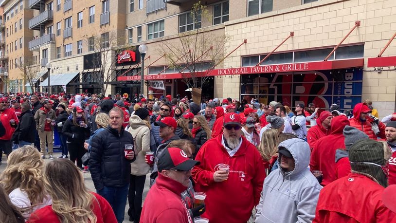 The scene at The Banks on Opening Day before a game between the Reds and Cardinals on Thursday, April 1, 2021, at Great American Ball Park in Cincinnati. David Jablonski/Staff