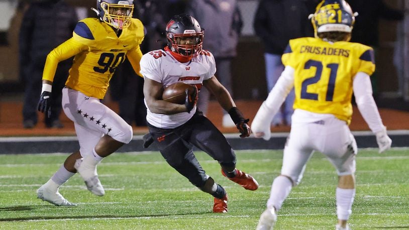Lakota West running back Cameron Goode carries the ball during their Division 1 playoff football game against Moeller Friday, Nov. 19, 2021 at Dwire Field at Atrium Stadium in Mason. NICK GRAHAM / STAFF