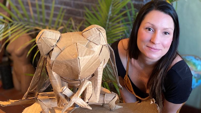 Leah Hughes is pictured with her award-winning “cicada” entry. Hughes was recently awarded a $500 cash prize for winning Saica Group’s “Sustainable Box Contest.” PROVIDED