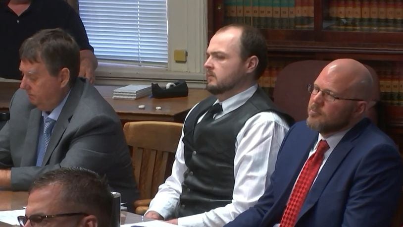 George Wagner IV, middle, is seen in court in Pike County on Monday, Sept. 12, 2022. Wagner faces multiple counts in the 2016 murders of eight members of the Rhoden family. LIVE FEED PHOTO/WCPO