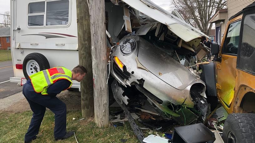 The driver of a Porsche drove off the left side of the road in the three thousand block of Springfield-Xenia Road and struck two mailboxes, a fence, two cars and a camper parked in front of a house Monday afternoon. The driver was not injured in the crash that left the Porsche inside the camper. 