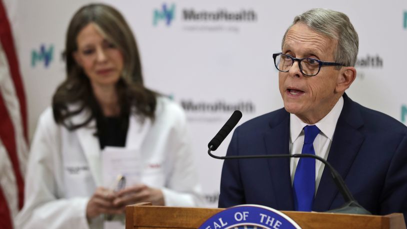 Ohio Governor Mike DeWine gives an update at MetroHealth Medical Center on the state’s preparedness and education efforts to limit the potential spread of a new virus which caused a disease called COVID-19, Thursday, Feb. 27, 2020, in Cleveland. (AP Photo/Tony Dejak)