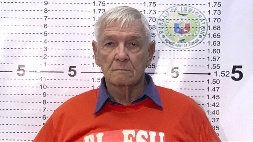 In this Dec. 5, 2018, photo released by the Bureau of Immigration Public Information Office, American Roman Catholic priest Rev. Kenneth Bernard Hendricks, 77, poses for his mugshot at the Bureau of Immigration in Manila. Philippine immigration authorities say they have arrested Hendricks, who is accused of sexually assaulting altar boys in a church in Naval in the island province of Biliran, central Philippines, in a case one official described as "shocking and appalling."