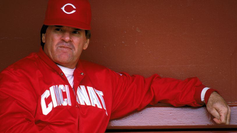 SAN FRANCISCO - 1989: Manager Pete Rose #14 of the Cincinnati Reds sits in the dugout during the game against the San Francisco Giants at Candlestick Park during the 1989 MLB season in San Francisco, California. (Photo by Otto Greule Jr./Getty Images)