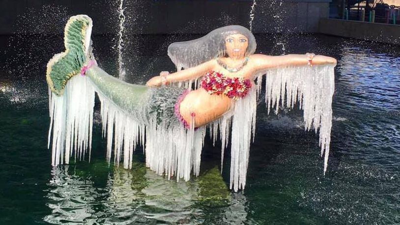 Icicles hang from a mermaid at the Nauticus museum in Norfolk, Virginia.