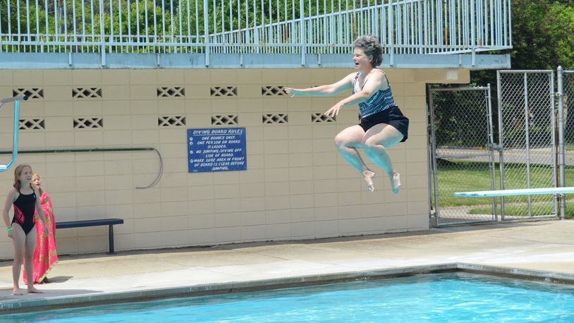 Oxford Mayor Kate Rousmaniere officially opened the pool for its final season of use with a cannonball dive. It was the third year she opened the summer season with a jump into the pool. BOB RATTERMAN/CONTRIBUTED